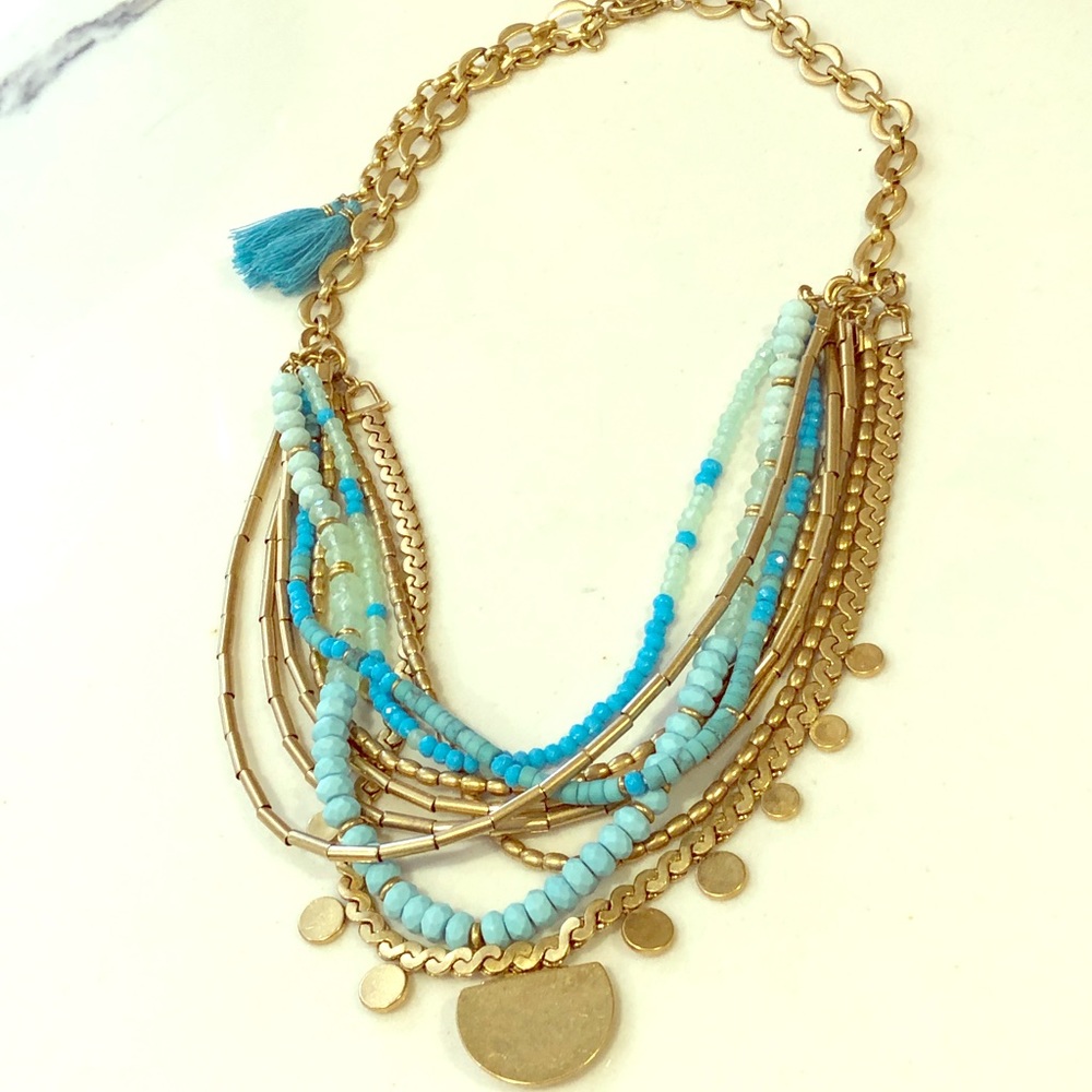 Gold and turquoise multi layer necklace.